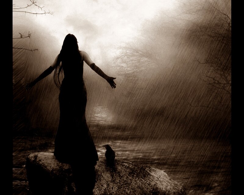 Woman in Rain on Rock