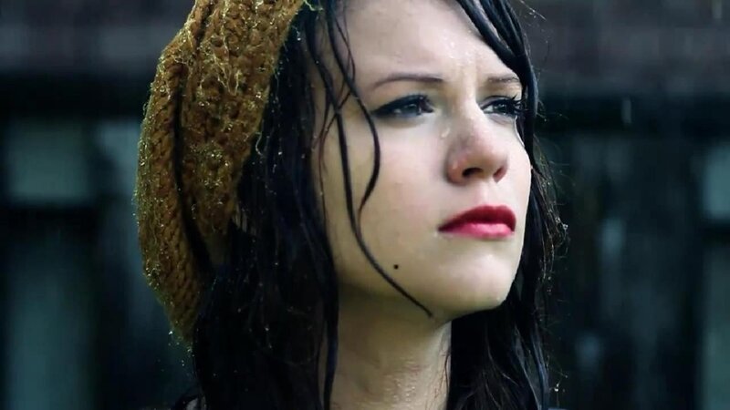 woman in rain with beanie