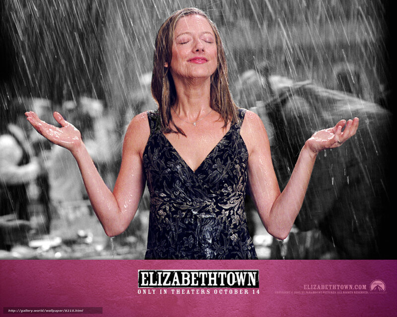 woman in rain with eyes closed