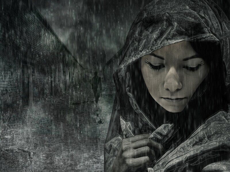 woman in rain with figure behind
