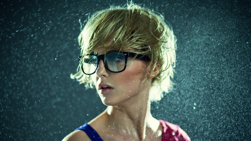 woman in rain with glasses