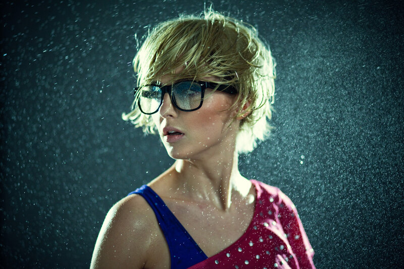 woman in rain with glasses