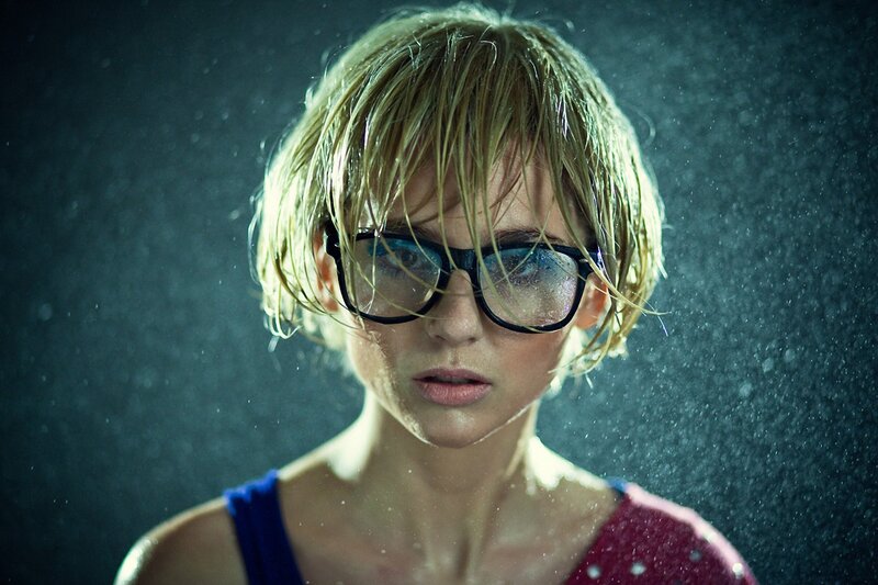 woman in rain with glasses
