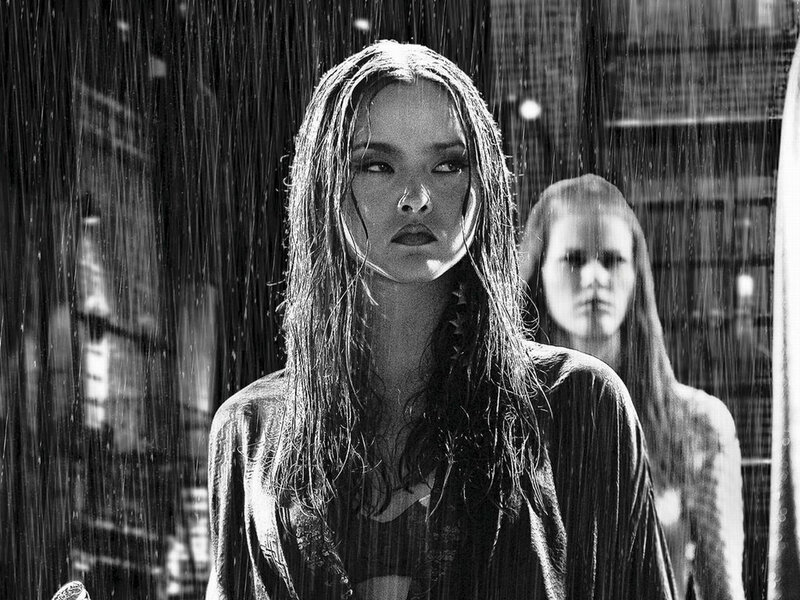 woman in rain with reflection