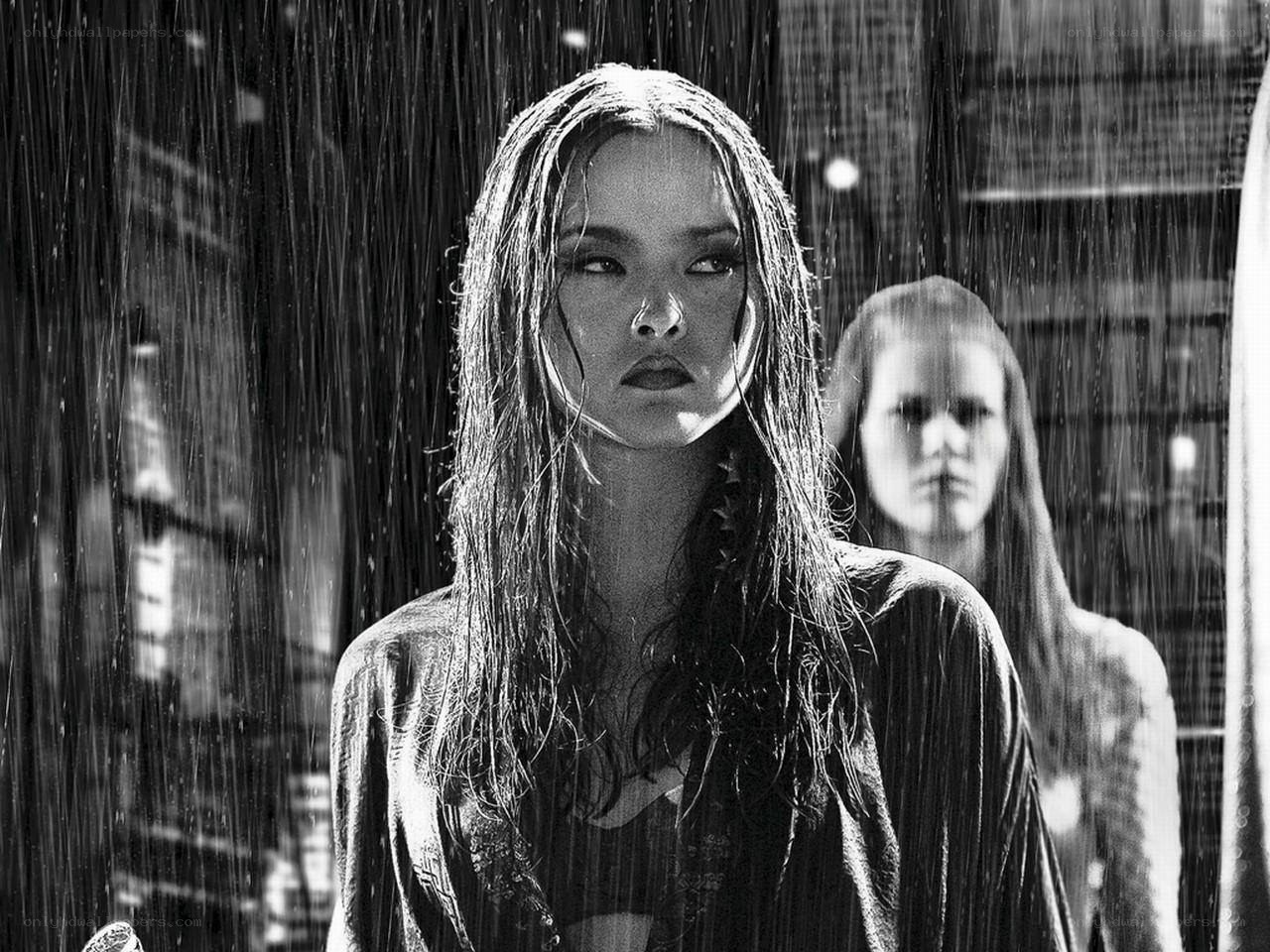 woman in rain with reflection