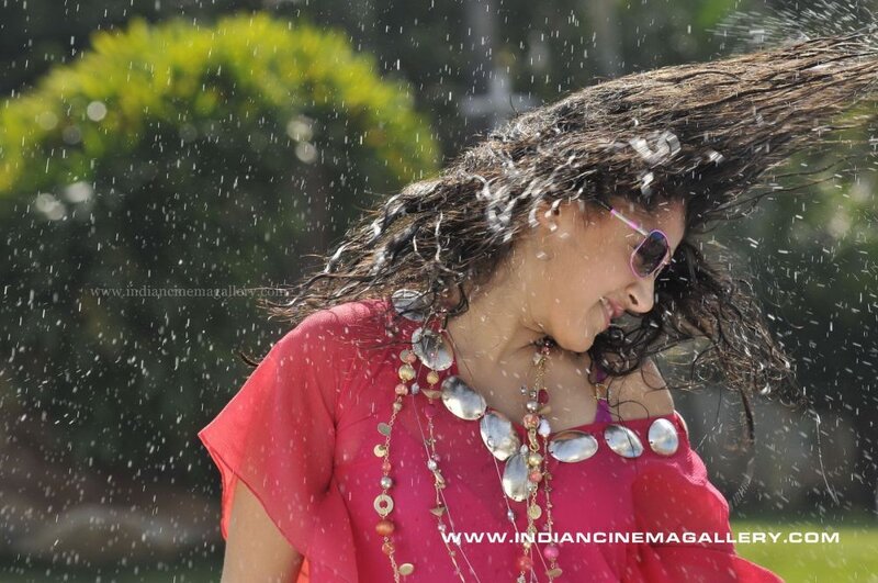 woman in rain with sunglasses