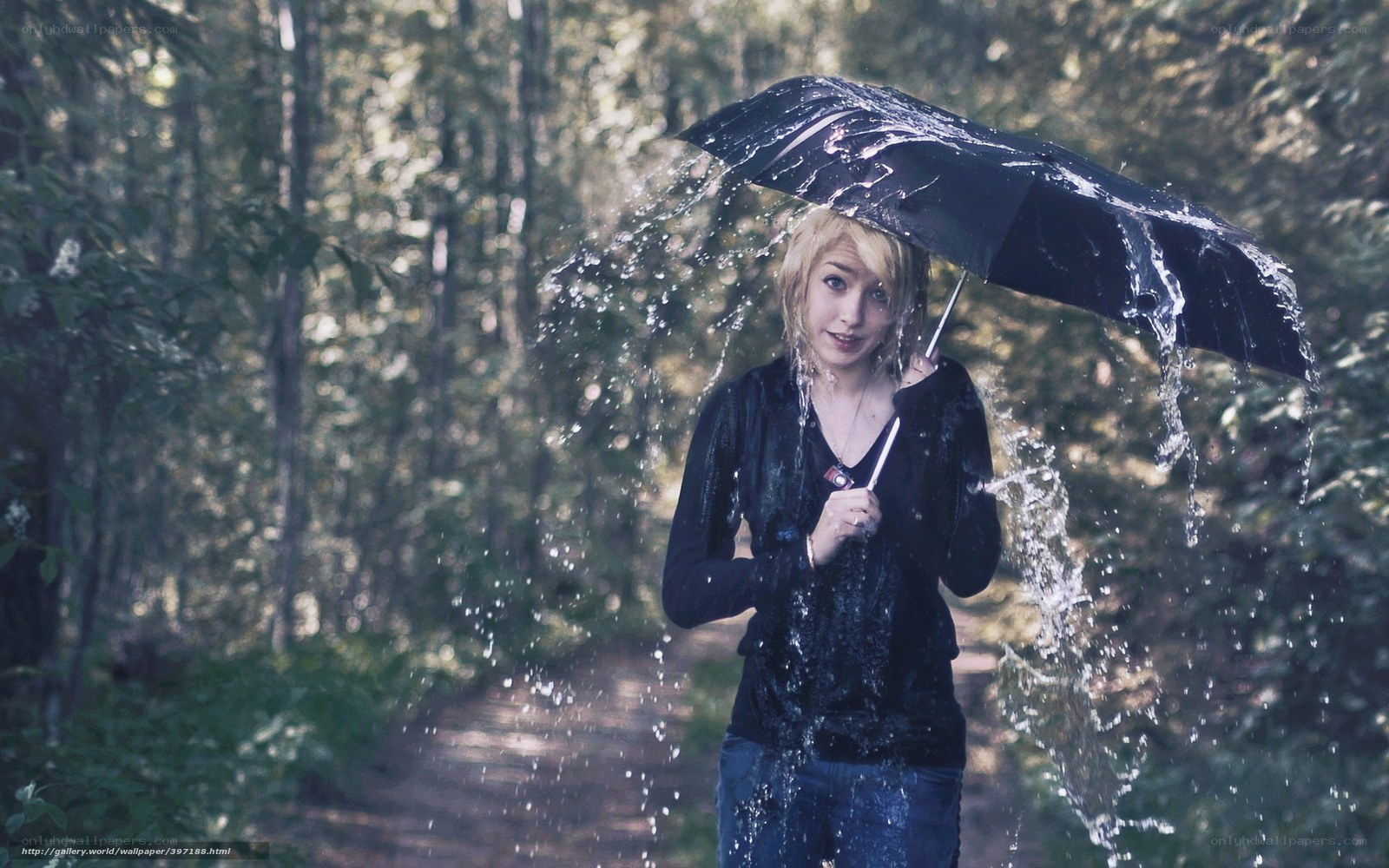 woman in rain with umbrella