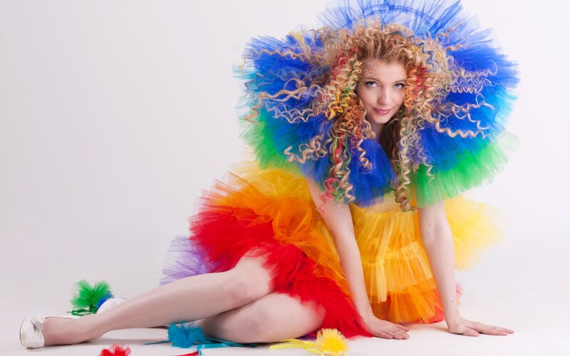 Woman in Rainbow Costume — Blue
