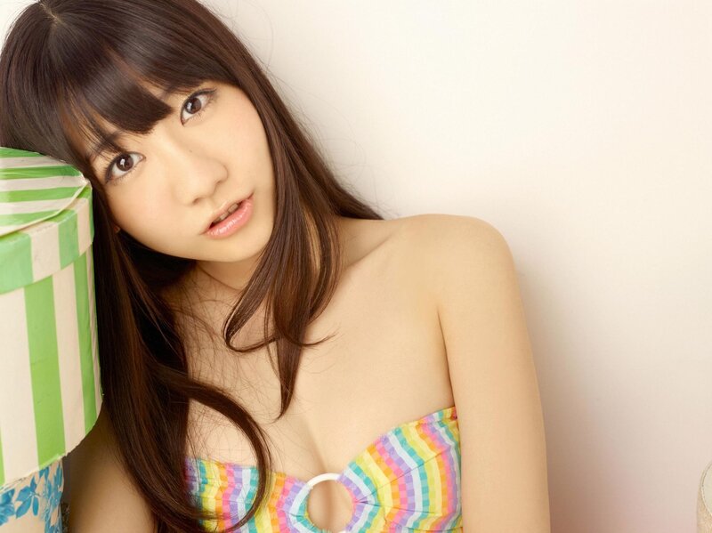 woman in rainbow swimsuit