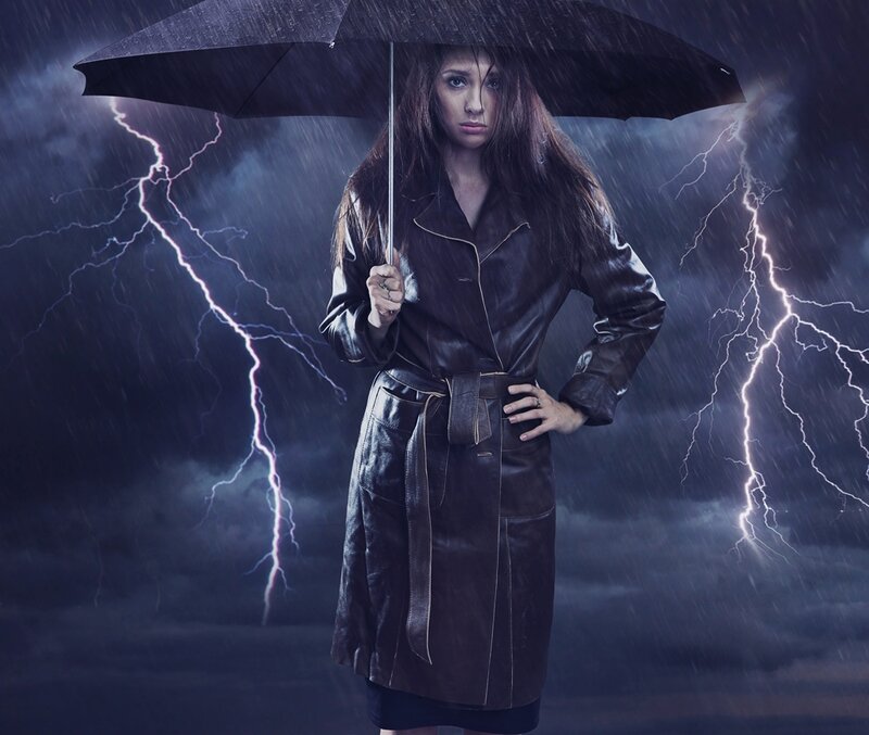 Woman in Raincoat — Black