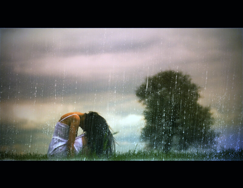 woman in rainstorm