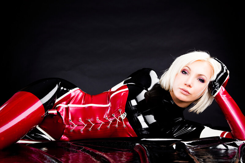 woman in red and black latex