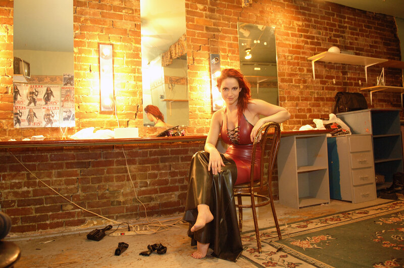 Woman in Red and Black Outfit — Dramatic, Night