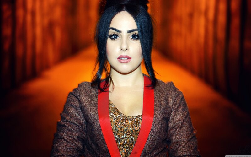 woman in red and brown outfit