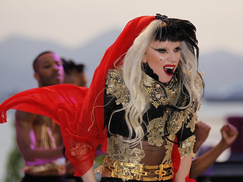 Woman in Red and Gold Costume — Dramatic