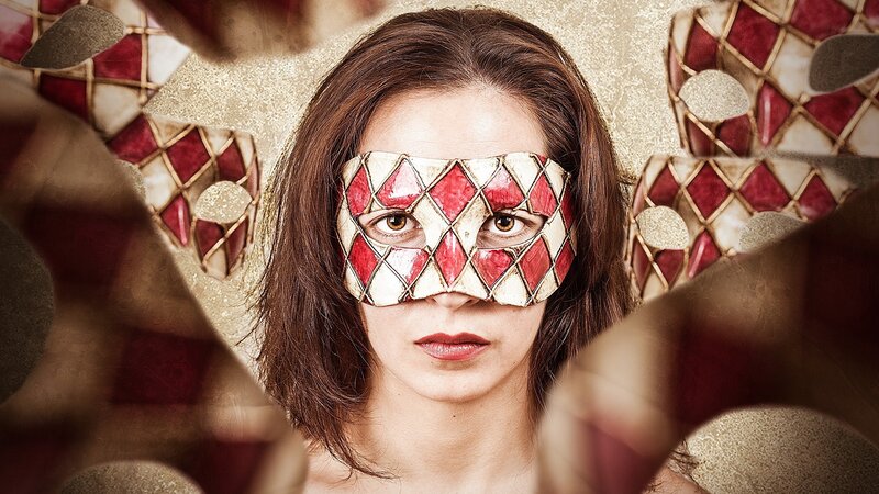 woman in red and white mask