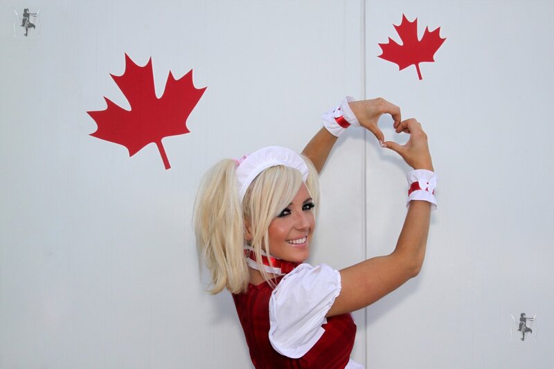 Woman in Red and White Outfit — Happy