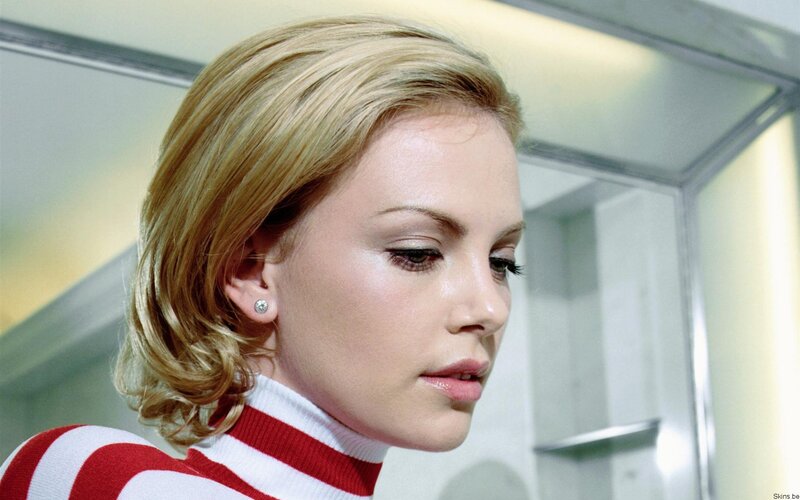 woman in red and white striped sweater