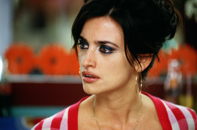 woman in red and white striped top