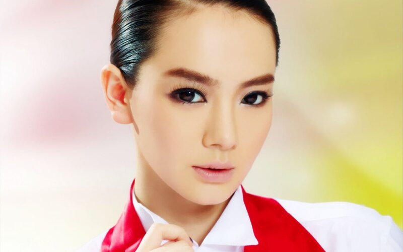 woman in red and white uniform