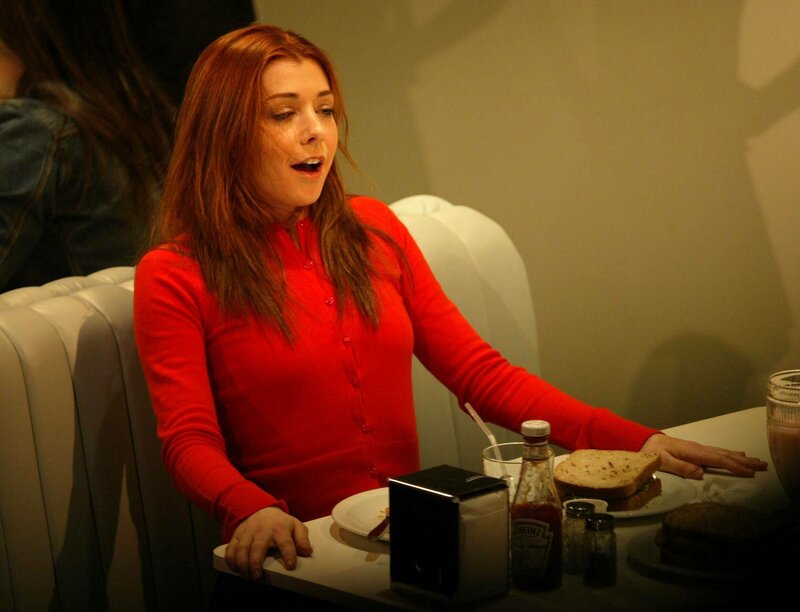 woman in red at a restaurant