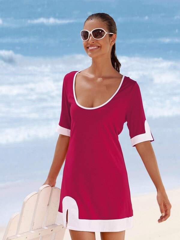 Woman in red beach dress