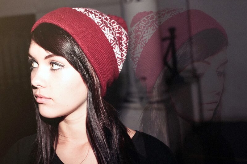 woman in red beanie