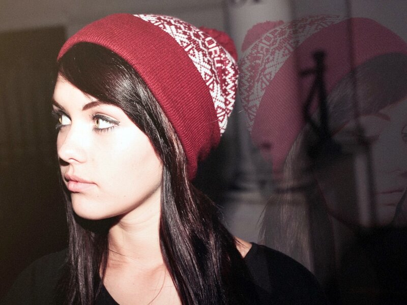 woman in red beanie