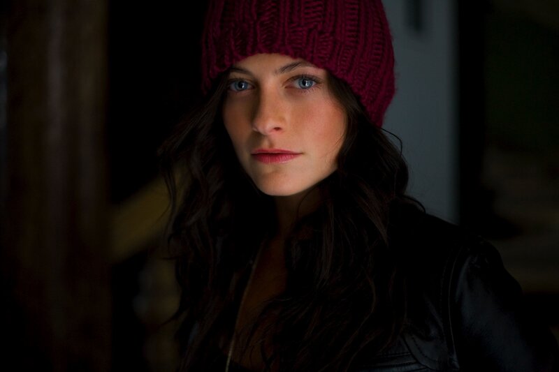woman in red beanie