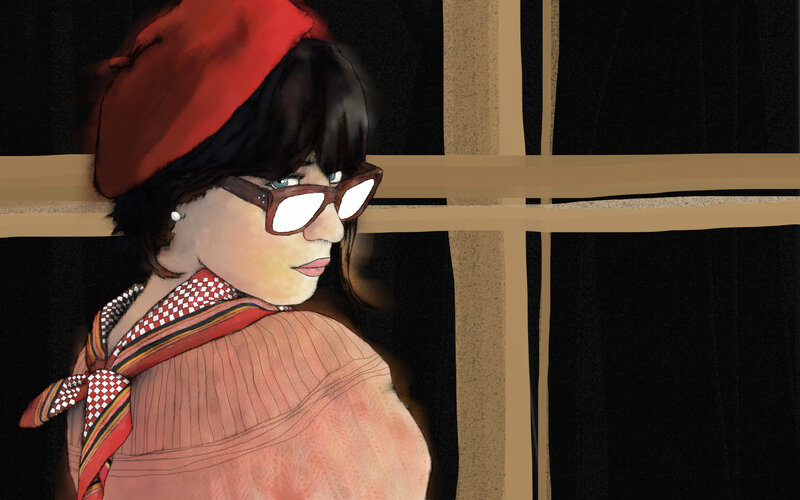 woman in red beret and glasses