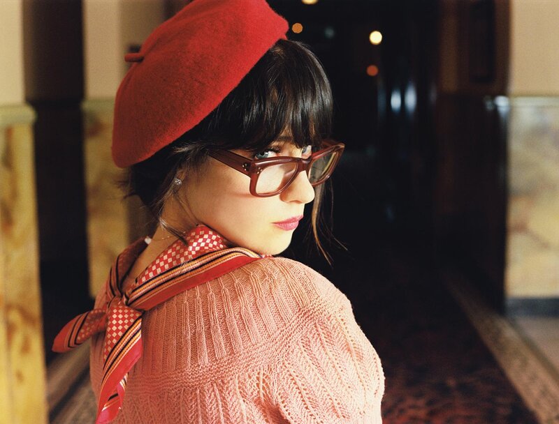 woman in red beret and glasses