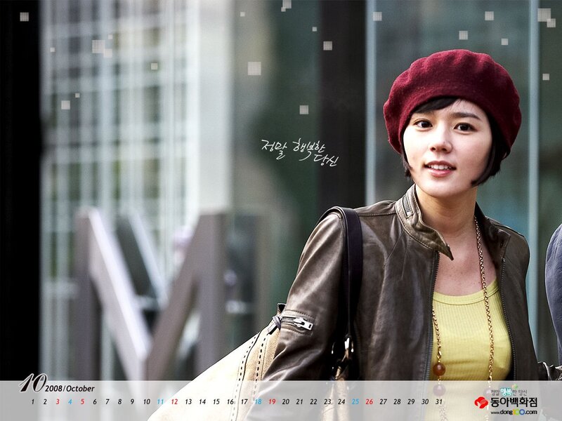 woman in red beret smiling