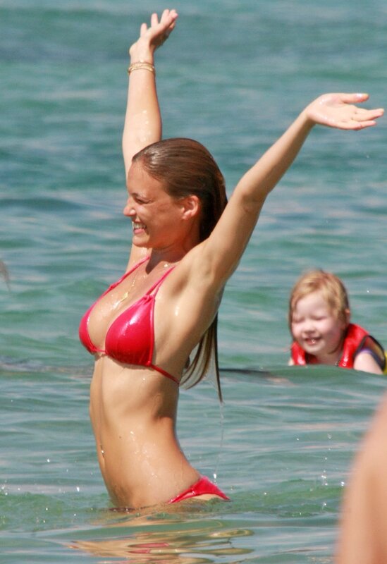 Woman in red bikini at beach