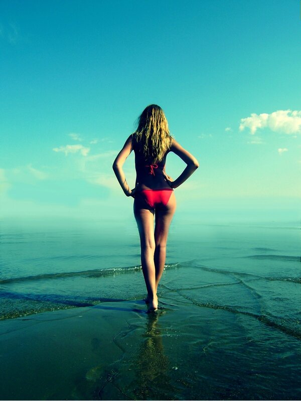 woman in red bikini at beach