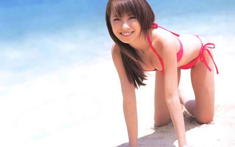 woman in red bikini at beach