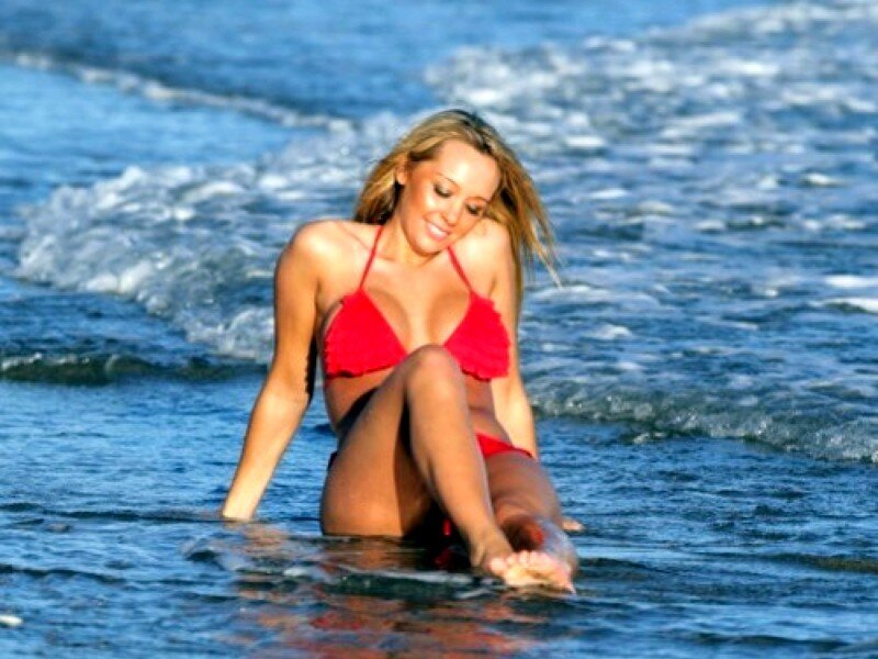 woman in red bikini at beach