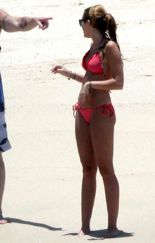 woman in red bikini at beach