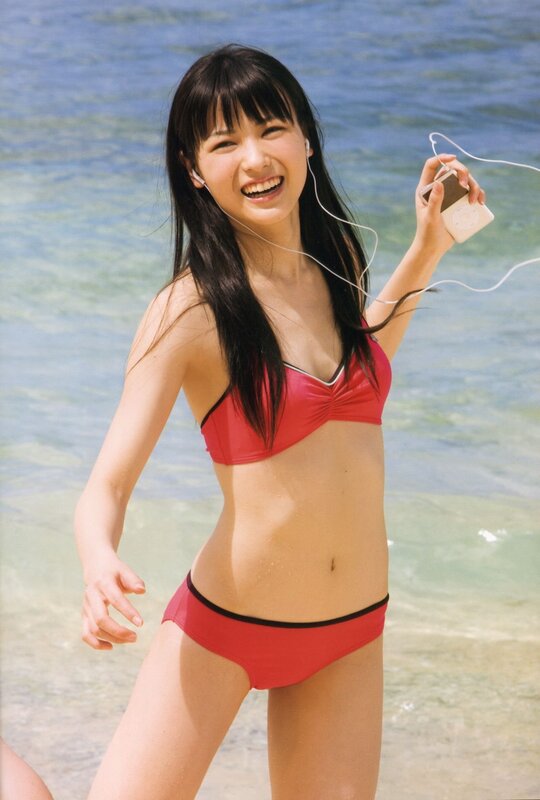Woman in red bikini at beach