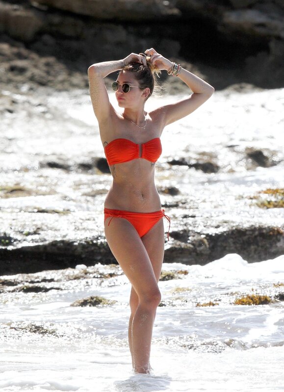 woman in red bikini at beach