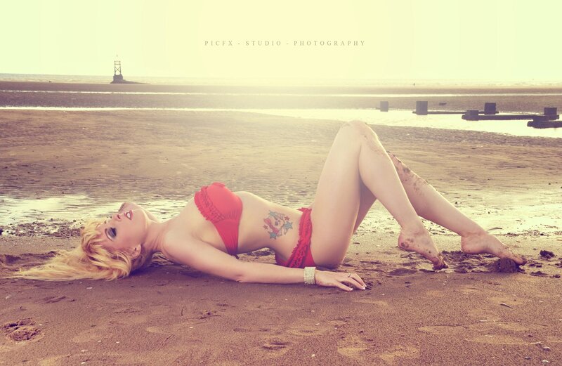 Woman in red bikini on beach