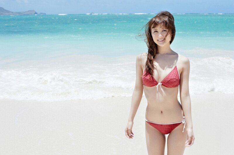 Woman in red bikini on beach