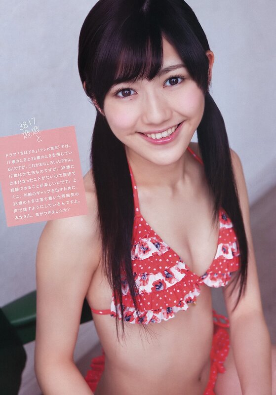 woman in red bikini smiling