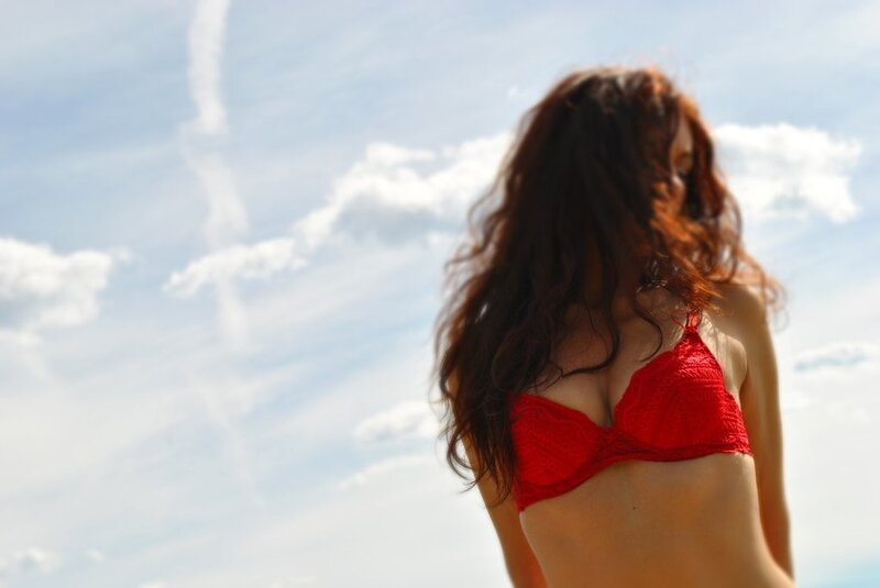 Woman in Red Bikini Top — Serene