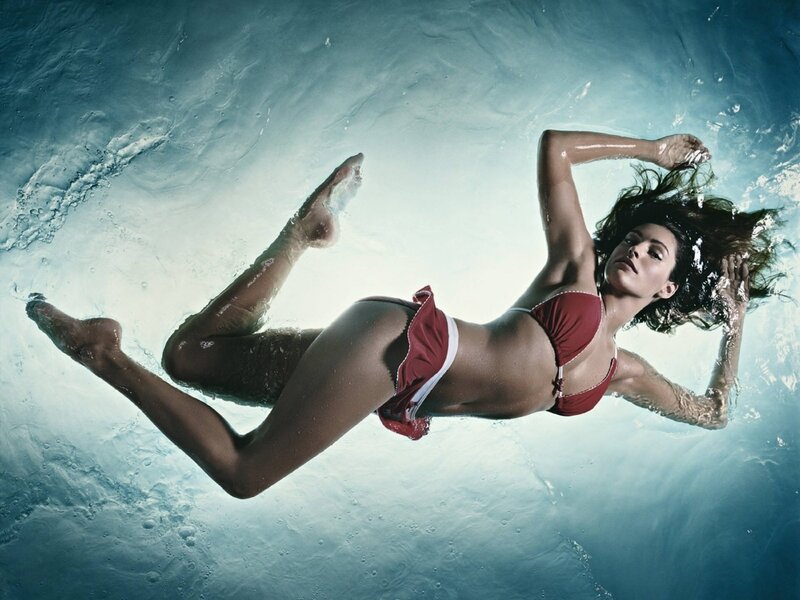 woman in red bikini underwater