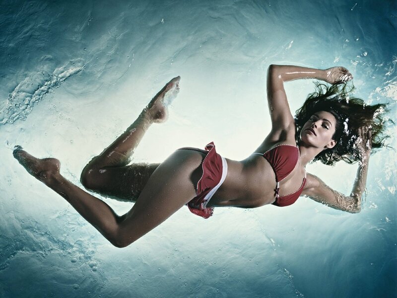 woman in red bikini underwater