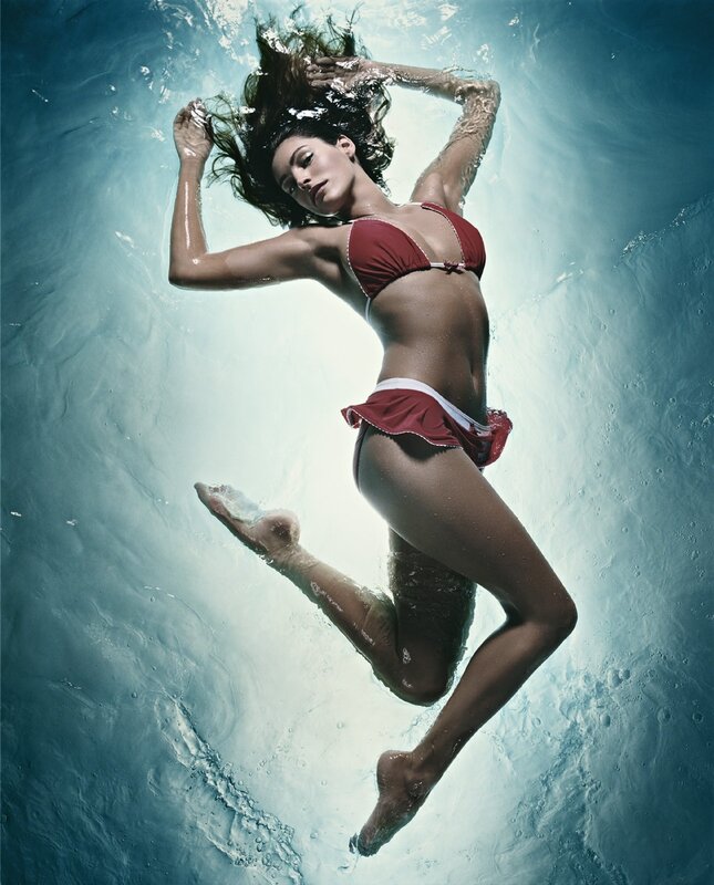 woman in red bikini underwater