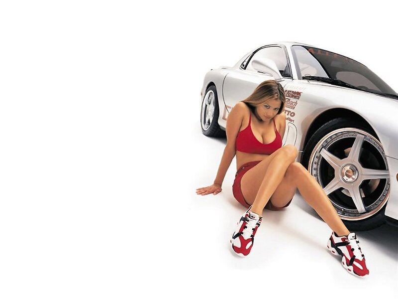 woman in red bikini with sports car