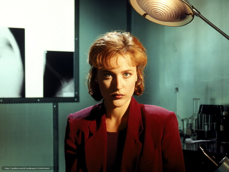 Woman in red blazer in lab
