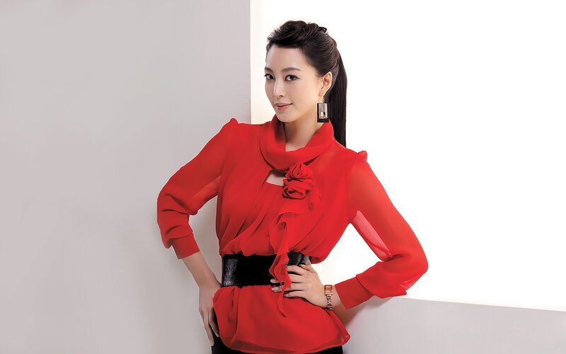 Woman in Red Blouse — Confident, Photograph, Earrings