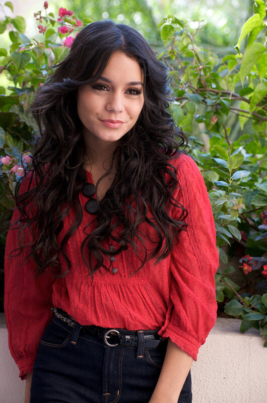 woman in red blouse outdoors